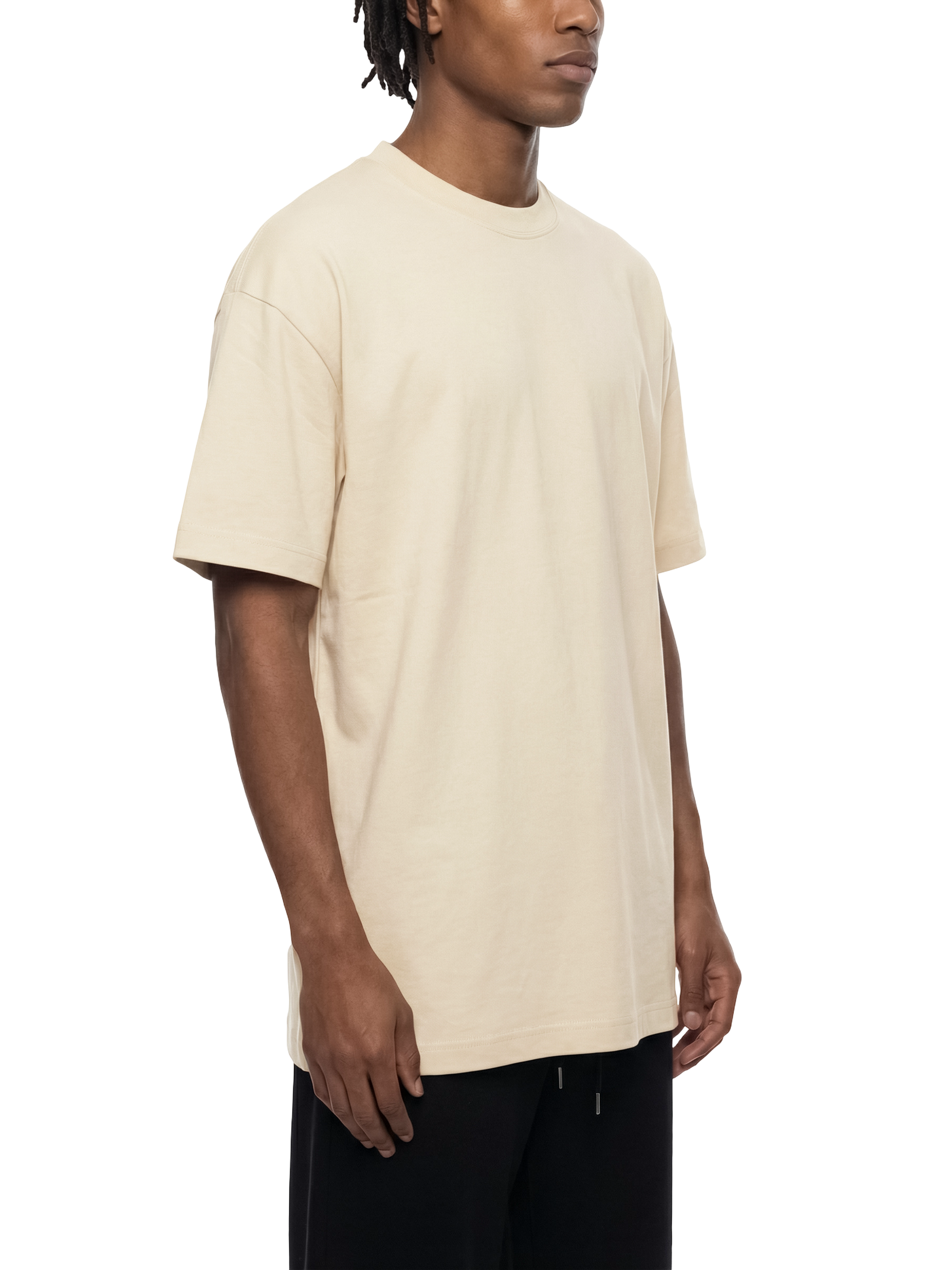 Person wearing a beige t-shirt on a white background