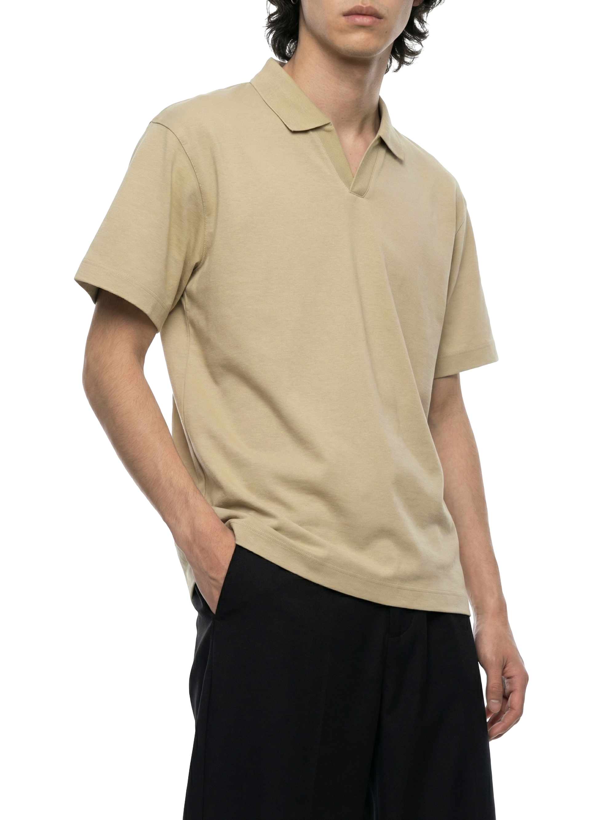 Person wearing a beige polo shirt and black pants on a transparent background
